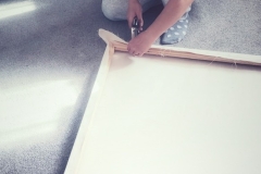 Assembling the canvas on the wood  frame